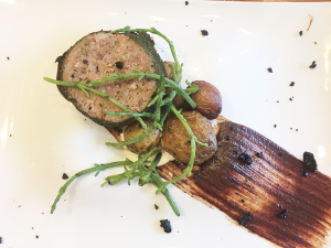 Fourth course: Lamb sausage with roasted pee-wee potatoes, sea beans and black olive puree.