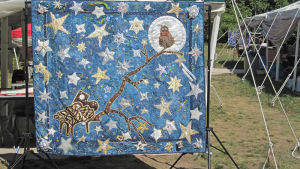 Sample of quilt created by Laurie Leonard of Syracuse. She is part of the group Sankofa Piecemakers Quilting Group, which meets at Beauchamp Library in Syracuse.