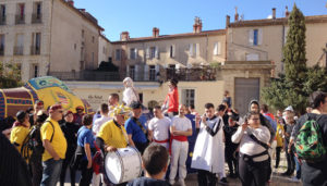 Learning a new language and exploring the culture of area, like this Occitan carnival in Beziers, can keep overseas retirees’ minds alert. 