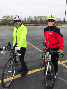 Mickey Piscitelli, left, and a friend, Lisa Farewell, riding their bikes late last fall. “Not too cold to ride...just layer up and wear your booties,” she said. Photo provided