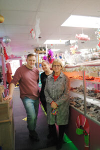 Sue Speech pictured with her son, Michael Jr., and daughter, Connie, who run Speach Family Candy Shoppe in Syracuse.