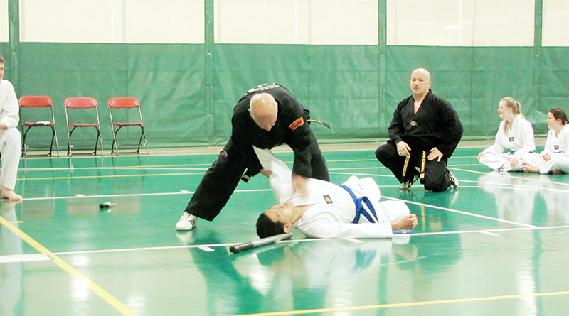 Antonio Eppolito, 74, recently received his fourth-degree black belt at The Le Moyne College Tae Kwon Do Club. Here he demonstrates his skill before receiving his belt and becoming a master.
