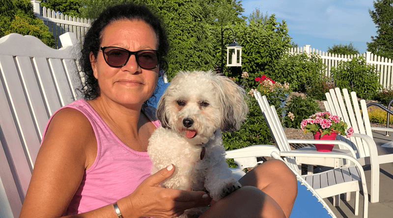 Maryann Roefaro holding her poodle, Millie. She recently published a new book that deals with everything from life, death and families. Roefaro is the CEO of Hematology/Oncology Associates of Central New York.