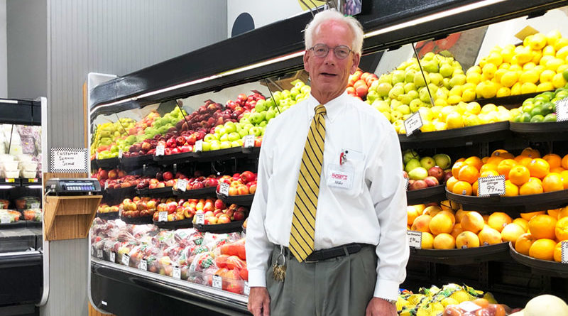 Mike Hennigan, owner of Nichols Supermarket in the heart of Liverpool. “I’ve worked pretty much every job in the store,’’ Hennigan says. “I used to be able to operate every piece of equipment.’’ Photo by Margaret McCormick