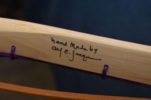 he signs each stick he completes