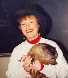 Rebecca Kendra Woods holds Punxsutawney Phil during his visit to Central New York in 1994. Woods convinced her cousin to bring the famous weather-forecasting groundhog to a school assembly.