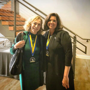 Higginbotham and Kathrine Switzer at the 2017 WISE Conference, two weeks after both women ran in the 2017 Boston Marathon honoring the 50th anniversary of Switzer's gender-breaking moment.